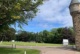 Cricket field on campus. Cricket, sport, outdoor, playing field.