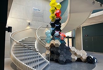 Modern staircase with art installation at English boarding school