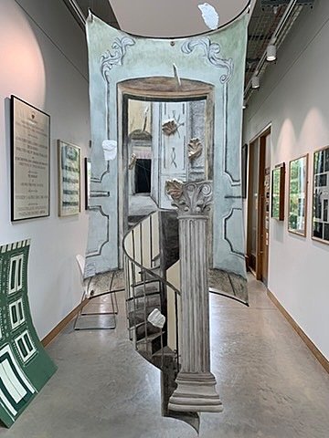 Modern art sculpture displayed in a bright exhibition hall