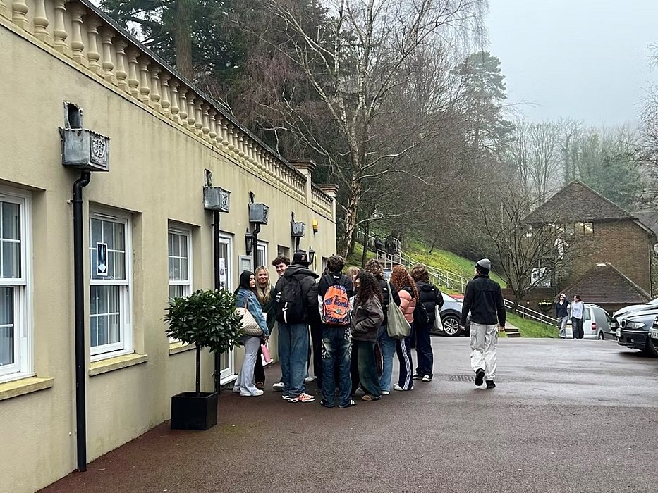 Pupils waiting outside for their class to start at Hurtwood House