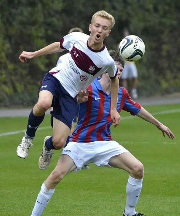 football players fighting for the ball
