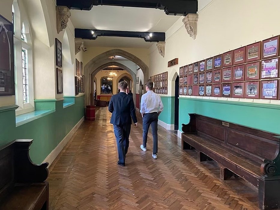 Hallway in Downside school, two boys walking away