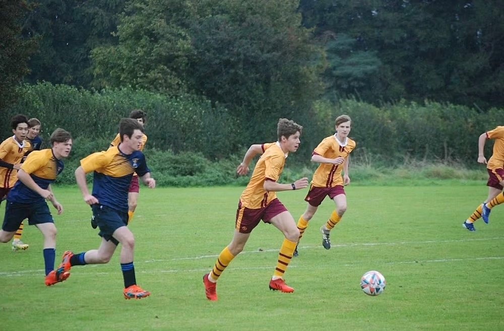 Boys at a football match