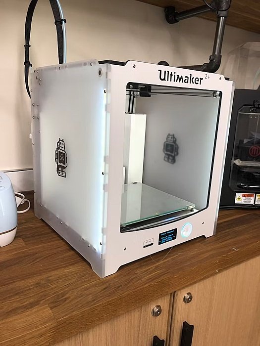 A ultimaker machine on a sideboard