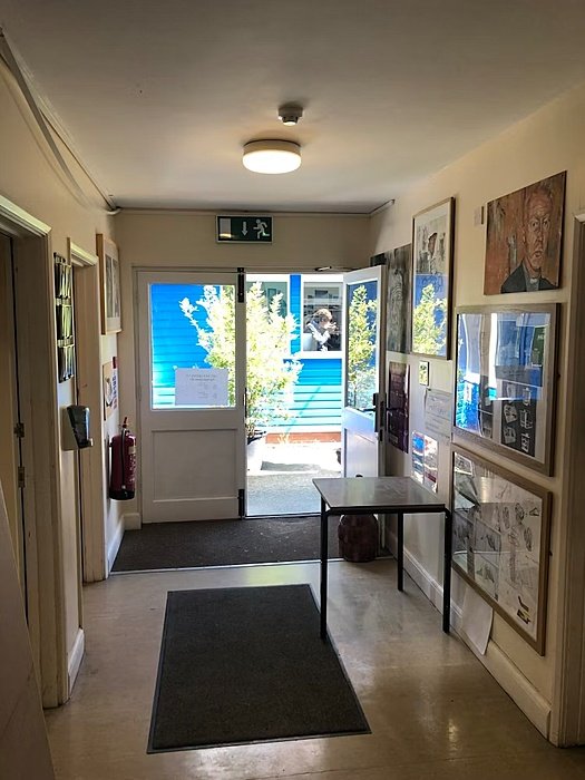 hallway with art on the walls