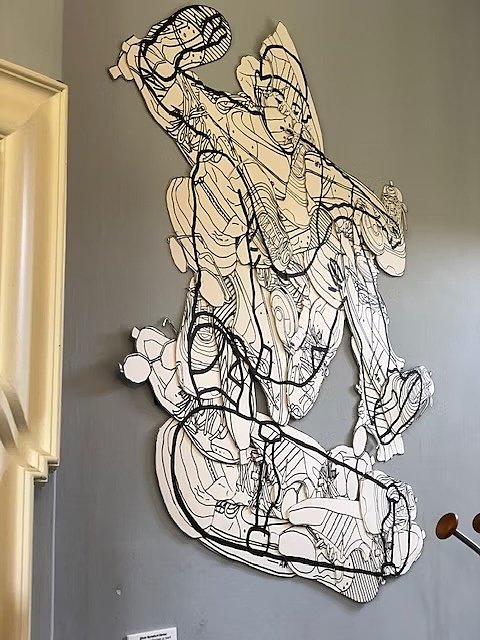 Streetart on a grey wall