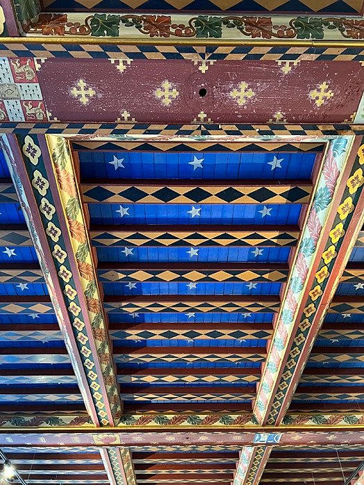 Textures of Worth: the main house's spectacular blue and red wooden ceiling