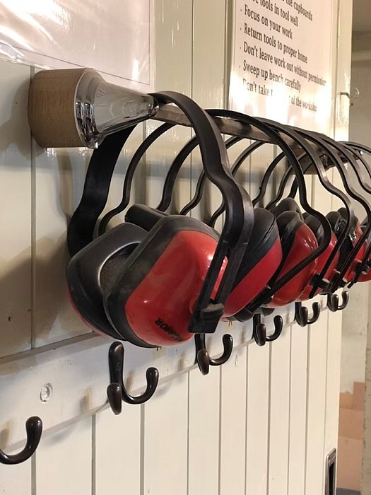 A row of ear protectors hanging outside the Design lab