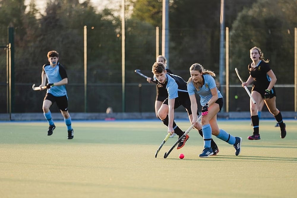 Mixed hockey match in action