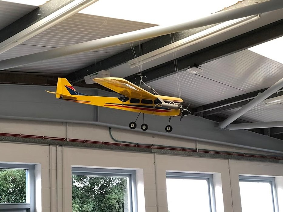 A yellow model of an airplane