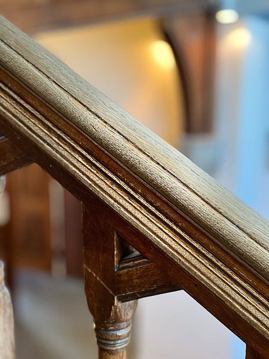 The bannister of the main house stairs