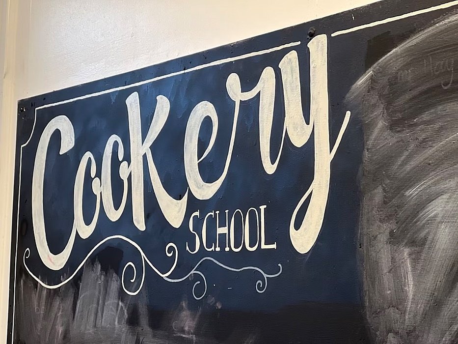 a cookery school sign
