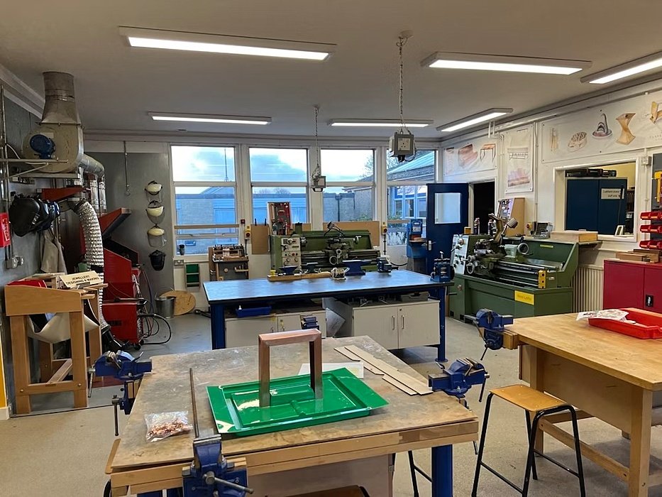 the school's DT workshop with workbenches and machines