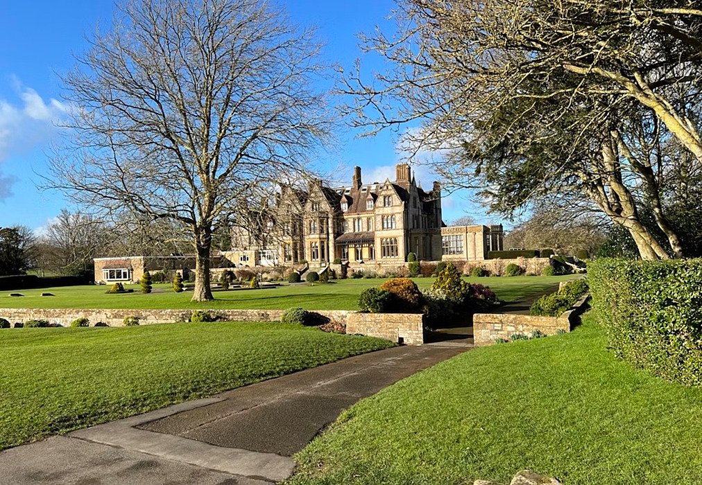 Old school building in a big park