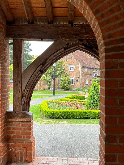 red brick and wooden arches on TASIS' beautiful campus