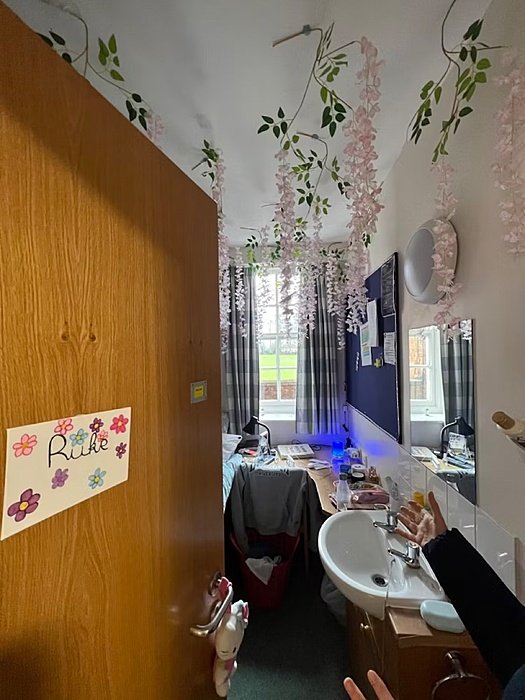 View into a room with sink and table