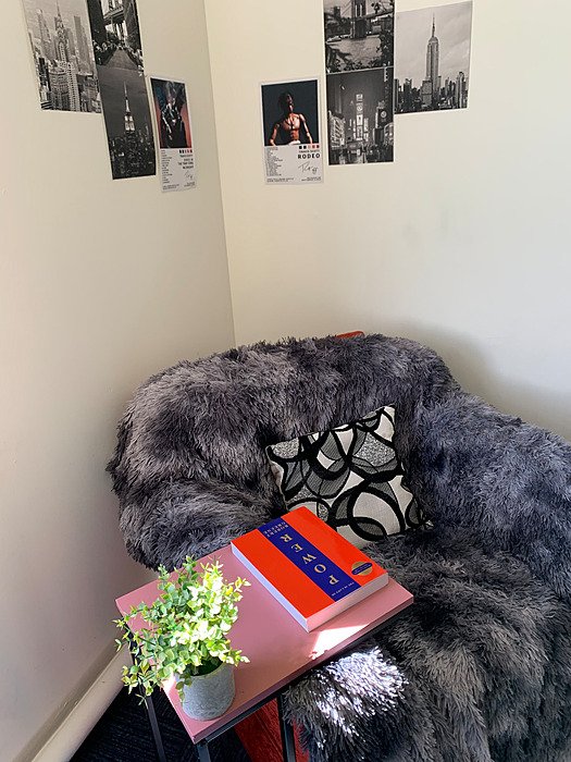 Cosy seating corner in a single room in a boarding house., boarding, student life.