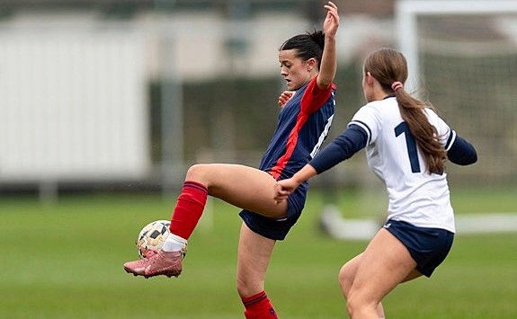 Girls play football