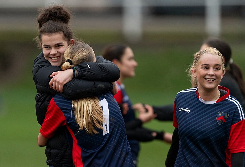 Girls play football