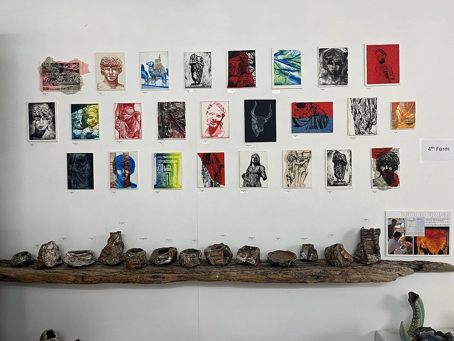 Art wall at St Edward’s Oxford showing student prints and ceramics.