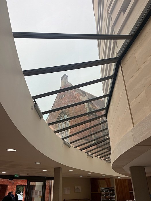 Skylight in St Edward’s Oxford building framing view of historic brickwork.