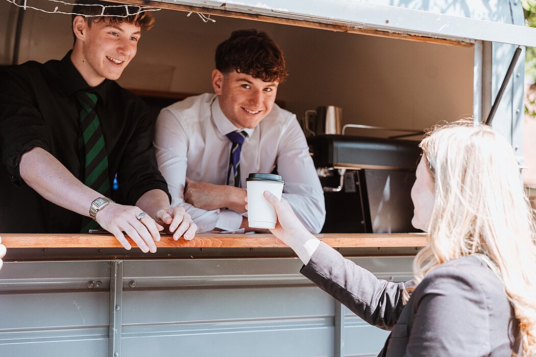 Students running a mobile coffee bar on the Wrekin College Campus