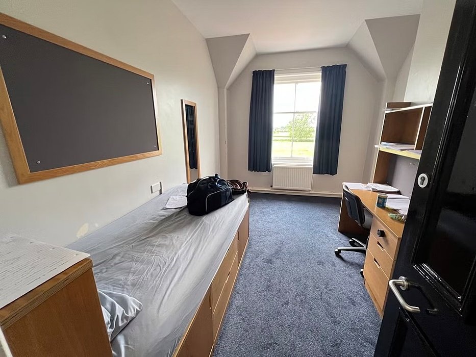 A deserted single room at School House at Repton School