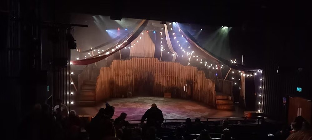 a theater stage lit up with light chains