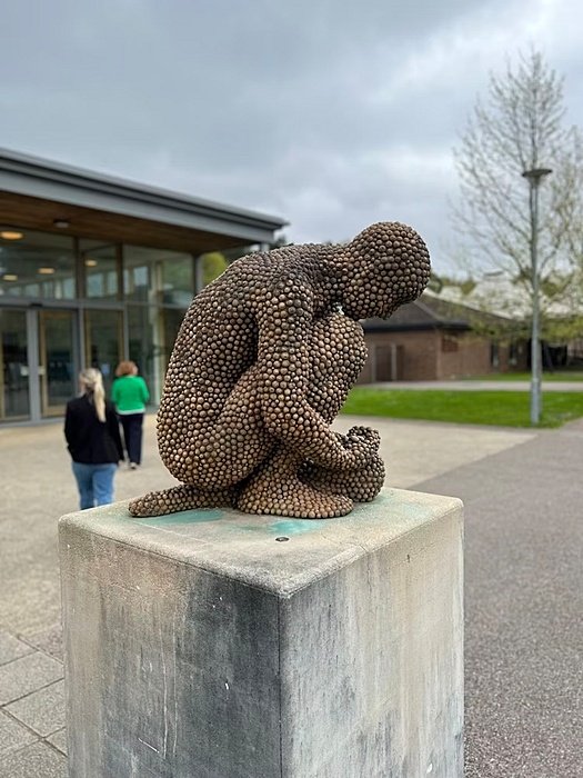 a sculpture on the school campus