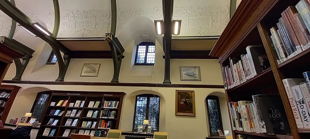A beautiful library with old wooden beams under the ceiling