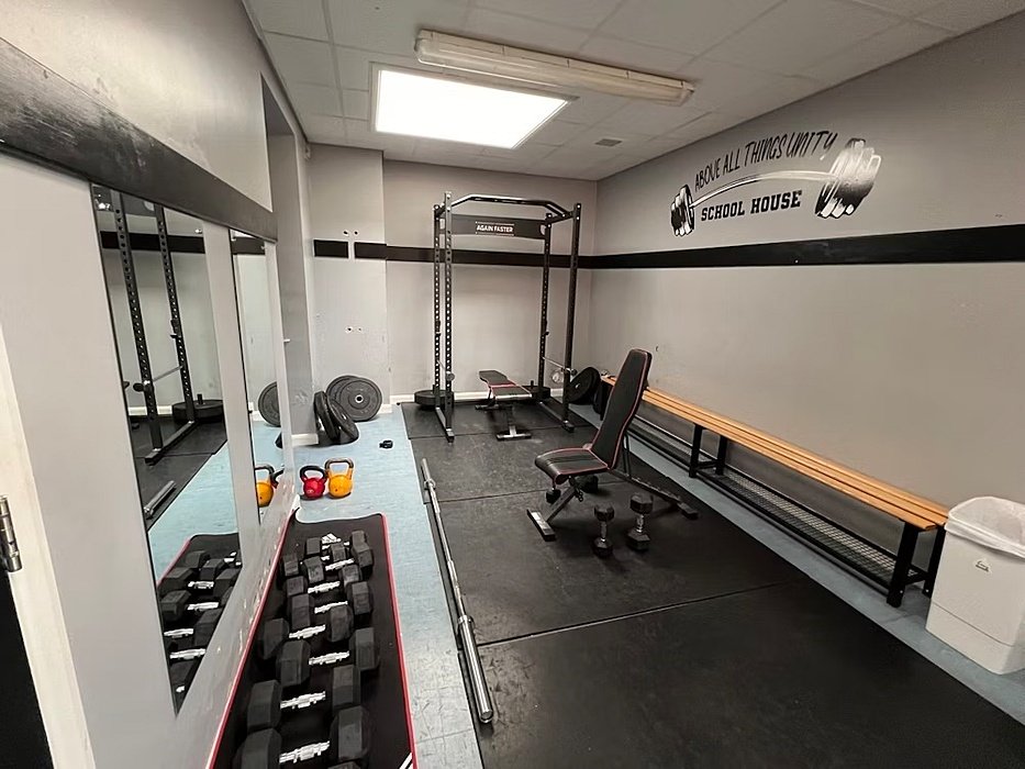 a gym in a boarding house at Repton School
