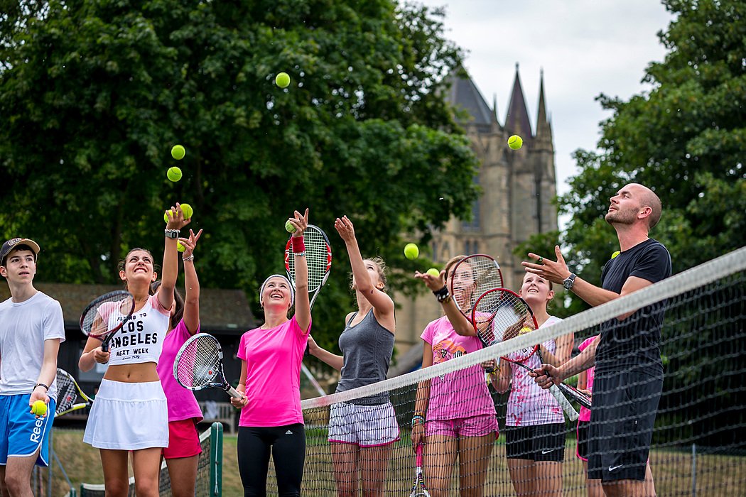 children in a tennis session at the Bede's Summer School on the Lancing campus