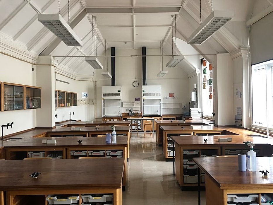 Bright Classroom with wooden tables