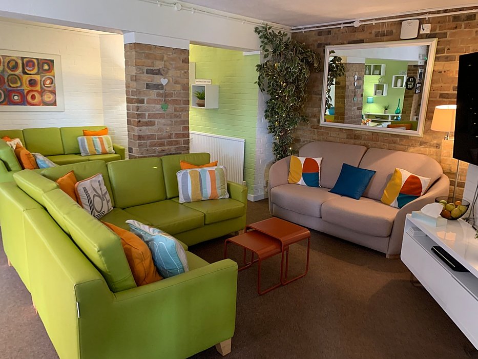 Bright lounge with sofas and cushions