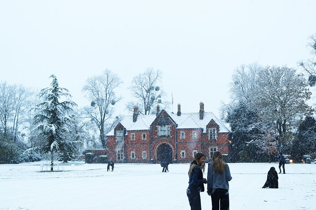 A white, snowy park infront of St Edwards main building, Christmas, winter