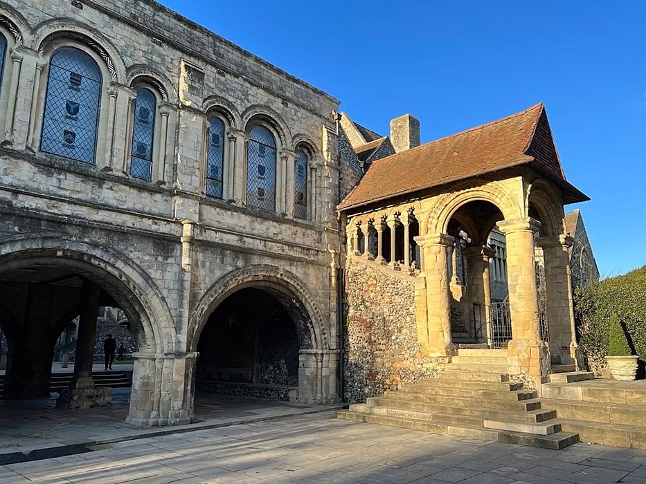 beautiful old stone archways and stairs going up to the chapel on King's Canterbury's campus