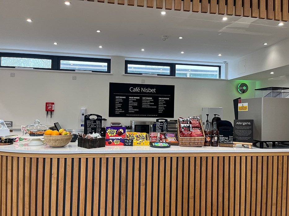 Modern school café with snacks and seating for students