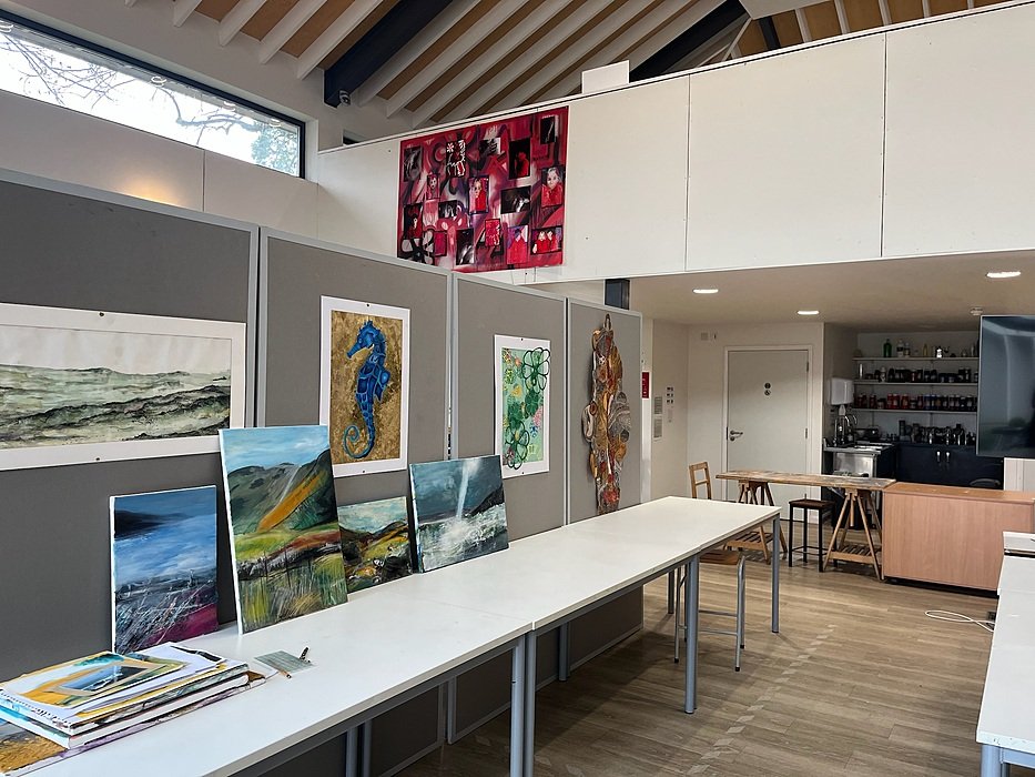 Art studio displaying student artwork in a creative environment