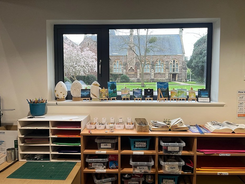Classroom with learning materials and view of historic campus