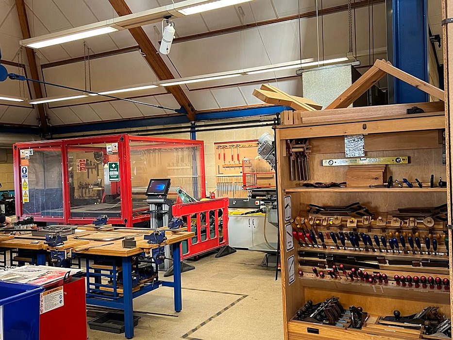 A very well equipped Design and Engineering workshop with workbenches, tools and machinery