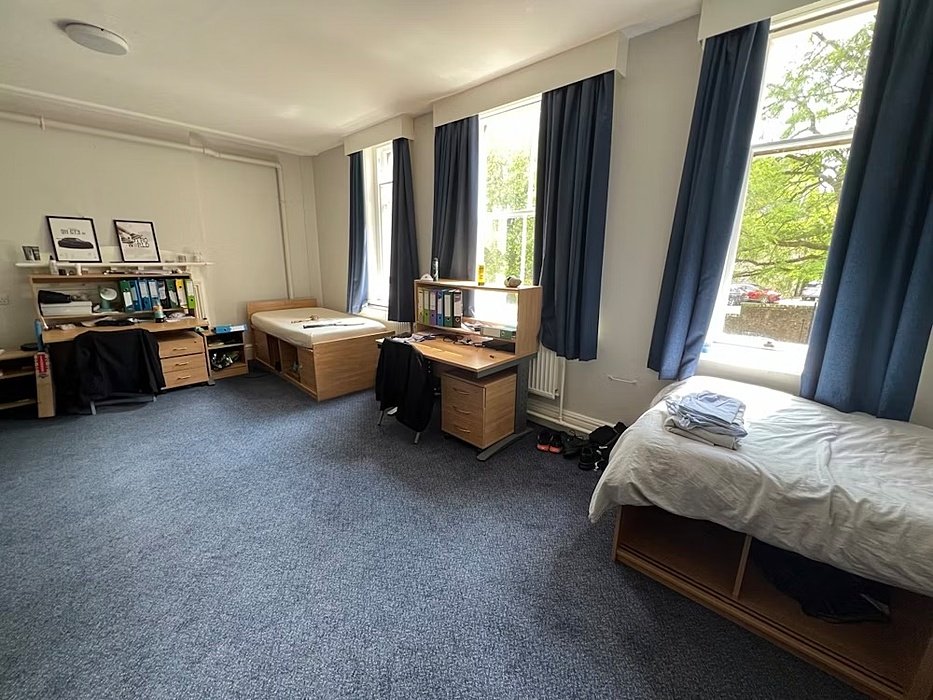 A spacious double room in the boarding house School House at Repton School