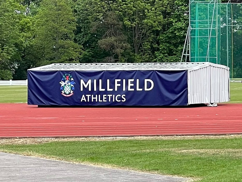 A cover for sports equipment on the school's sports grounds branded with "Millfield Athletics"