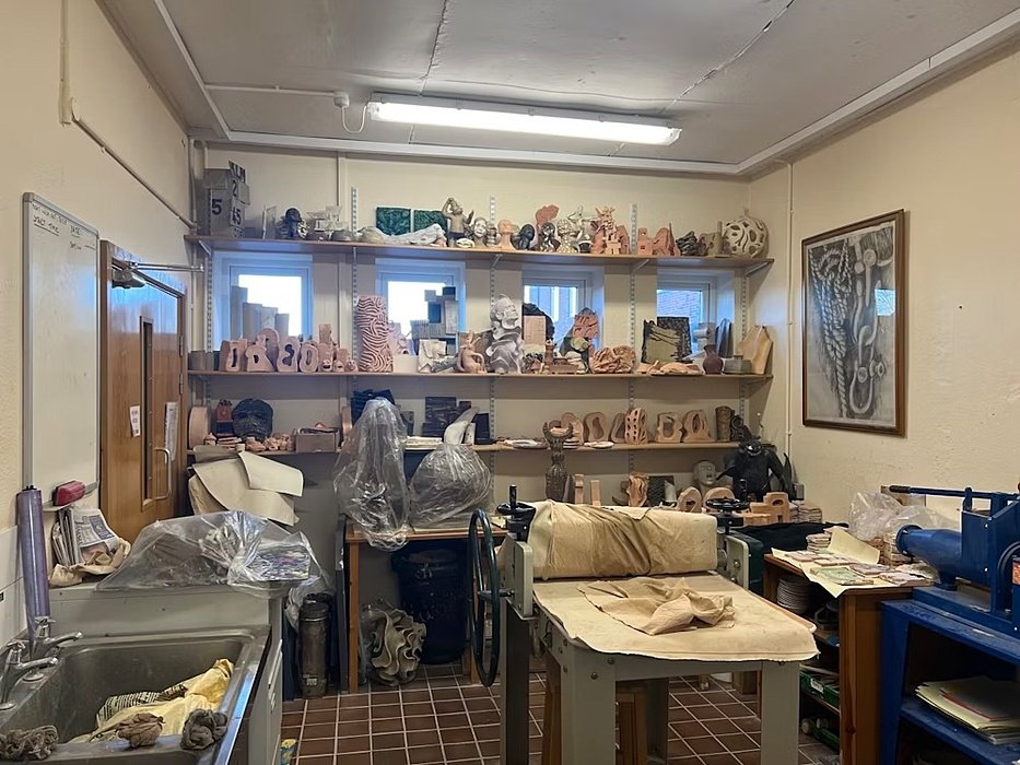 Shelves full of Pottery sculptures at The Oratory