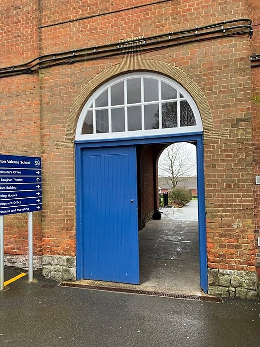 Red bricks and blue gates at Sutton Valence School