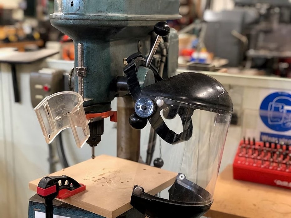 A drill and workbench in a Design and Technology Department