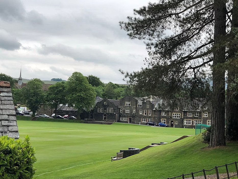 Sedbergh School's Cricket pitch and boarding houses as backdrop