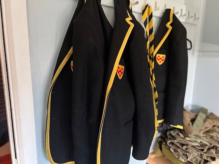 school uniforms at The Oratory hanging on hooks