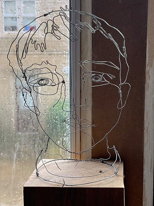 sculpture: head made out of wire