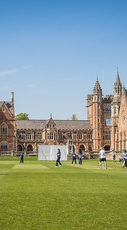 Clifton College and Campus with students playing cricket