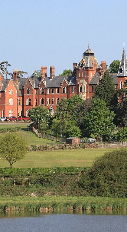 Framlingham College on its green campus and lake